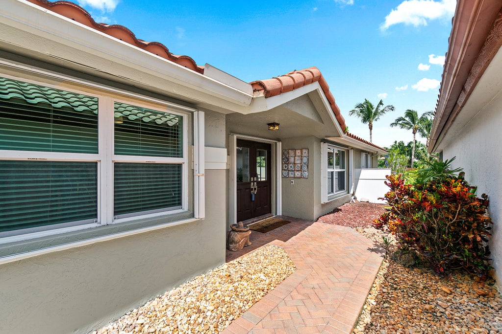 Photo of 11270 Cloverleaf Circle, Boca Raton, FL 33428 (MLS # B26085707)