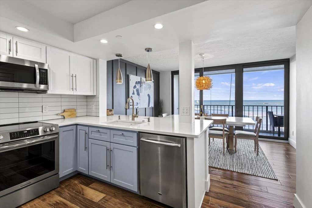 Photo of 8750 S Ocean Drive, Jensen Beach, FL 34957 (MLS # B26061810)
