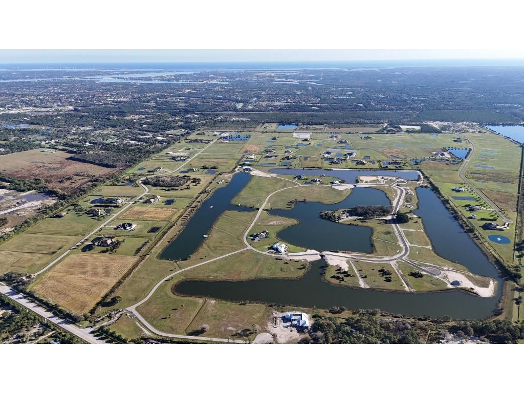 Photo of 6701 SW Pentalago Place, Palm City, FL 34990 (MLS # R11000184)