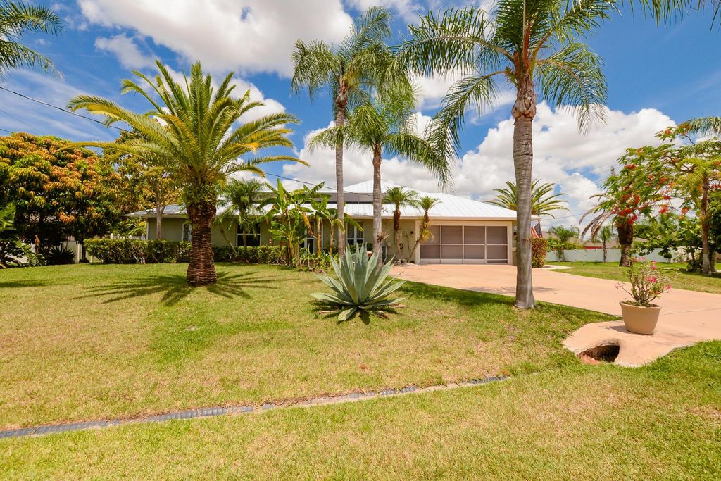 Photo of 6902 NW Jorgensen Rd, Port Saint Lucie, FL 34983 (MLS # R11109729)