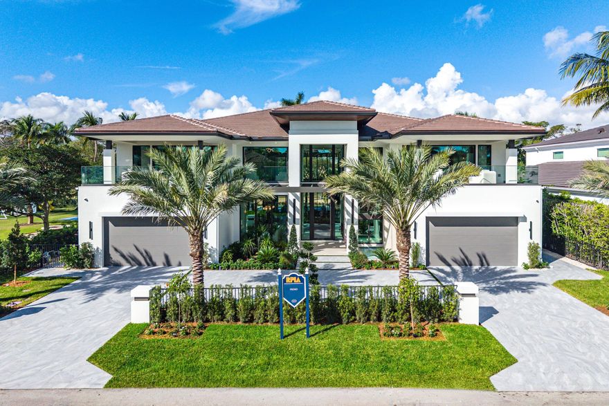 A showstopping Golf Course Masterpiece in Royal Palm Yacht & Country Club built by Primo Luxury Homes & designed by Arianna Tascione. This bespoke estate epitomizes the pinnacle of luxury living in the prestigious Royal Palm Yacht & Country Club. With 8,567 square feet under air and 12,301 total square feet, this six-bedroom, eight-and-a-half-bath architectural triumph is perfectly positioned on a premier golf course lot, offering uninterrupted vistas and meticulously curated interiors that reflect exceptional craftsmanship and modern sophistication. From the moment you arrive, the residence impresses with its oversized U-shaped motor court, lush landscaping, and a beautiful decorative wall fountain at the entry that offers a serene and welcoming introduction to the home. Inside, a dramatic entry hall reveals soaring ceilings, gallery walls and sweeping sight lines that carry directly to the 9th hole and the fairways beyond. Crafted for those who appreciate unparalleled detail, the home showcases five grand balconies thoughtfully positioned to capture panoramic golf views and enhance the home's indoor-outdoor lifestyle, along with three custom decorative fireplaces that elevate the ambiance of the principal living spaces. The first level is anchored by a primary suite of exceptional scale, offering separate, individually designed bathrooms each curated with luxurious materials and boutique-hotel finishes paired with beautifully crafted his-and-her dressing rooms and a concealed safe room seamlessly integrated into the custom millwork. On the second level, a junior primary suite offers an equally refined retreat for guests or extended family. A conjoined club room and executive office provide an elevated setting for work, leisure, and intimate gatherings, finished with exquisite craftsmanship throughout. The culinary spaces are nothing short of extraordinary. The main kitchen showcases two oversized double islands, custom cabinetry, and premier Wolfe appliances, complemented by a fully equipped catering kitchen for effortless entertaining. A climate-controlled wine room nearby offers a sophisticated display for collectors and seamlessly serves the dining and living areas. The great room is showcased by an architecturally crafted designer bar, creating a stunning focal point for memorable gatherings. For wellness, the home includes a private gym with an infrared sauna and shower, positioned to offer privacy and convenience without interrupting the home's elegant flow. Technological Enhancements, a comprehensive suite of smart home technology elevates comfort, security, and ease of living, including: Control4 Home Automation System, Control4 Centralized Lighting, Control4 Video Doorbell. In-ceiling audio throughout the home and patio, Hikvision camera system, Araknis enterprise-grade WiFi, Lutron motorized shades and drapes. Additional features include: Four-car garage plus dedicated golf cart bay, Full-house generator, two laundry rooms (first and second levels) and fully finished closets in every bedroom. Every finish and fixture has been meticulously selected bespoke, enduring, and uncompromisingly elegant. With panoramic golf course views from nearly every room, this residence stands as one of the most compelling and refined offerings within this prestigious enclave.

Square footage, room sizes, and dimensions are approximate and derived from builder plans, architectural drawings, or estimates. Actual measurements may differ due to construction variances. Buyers must verify all information, measurements, and specifications to their satisfaction.