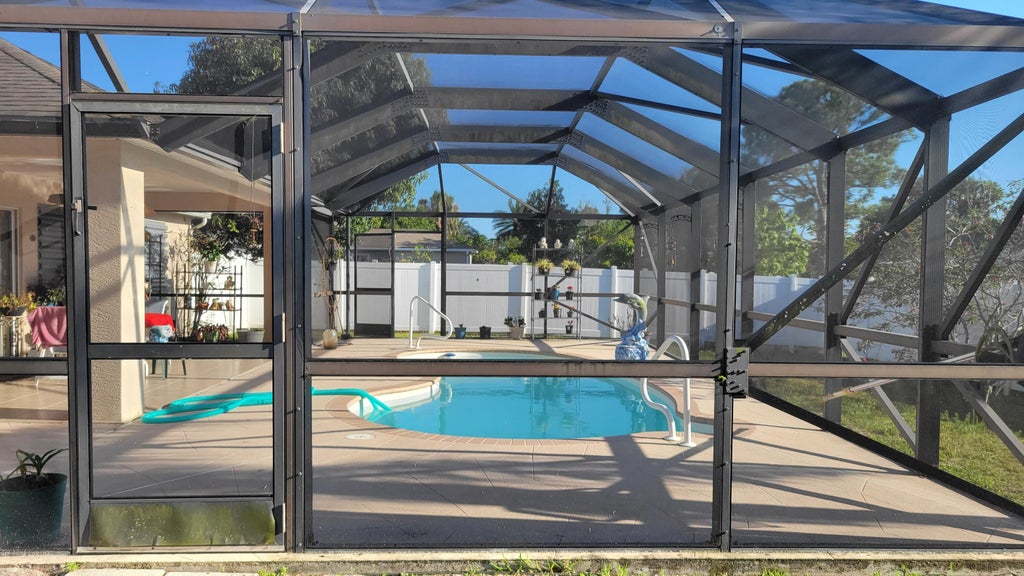 Photo of 402 NW Bayshore Boulevard, Port Saint Lucie, FL 34983 (MLS # R10984656)