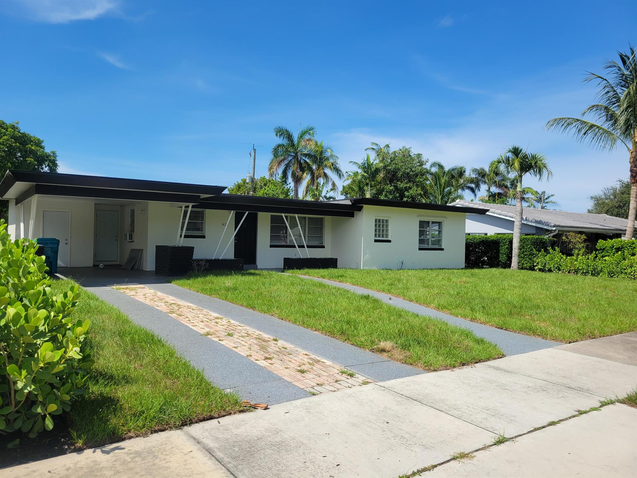 Fresh paint, new kitchen and bath, freshly landscaped, large, screened patio, washer and dryer, very clean house, close to shopping, beach and I95.