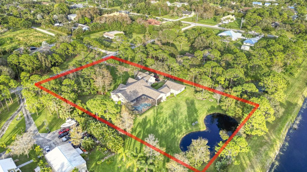 Photo of 7612 160th Lane N, Palm Beach Gardens, FL 33418 (MLS # R10883690)