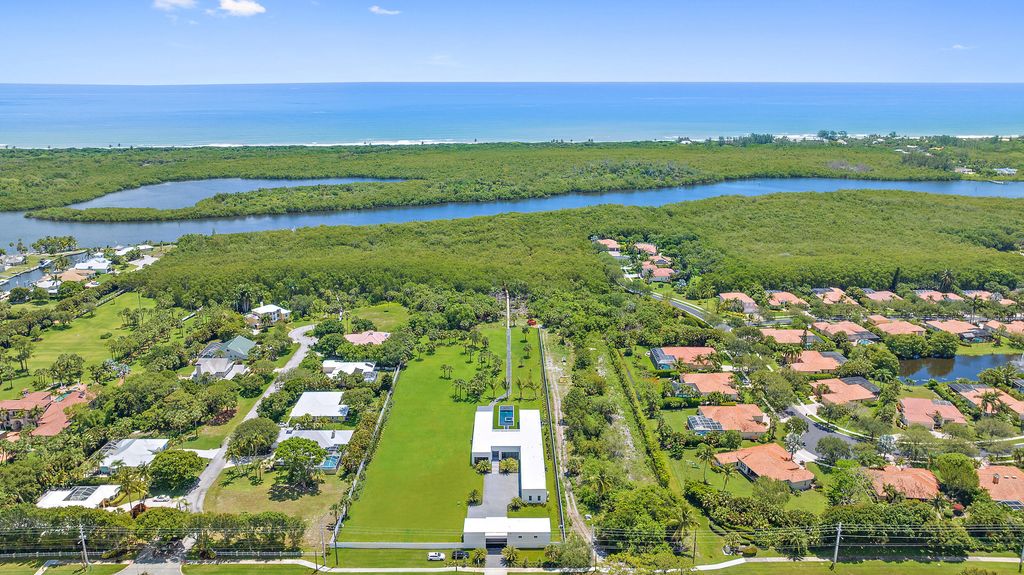 Photo of 9741 SE Gomez Avenue, Hobe Sound, FL 33455 (MLS # R10893619)