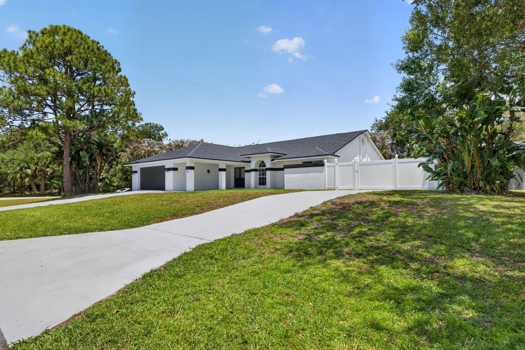 Photo of 1721 SW Ocean Cove Avenue, Port Saint Lucie, FL 34953 (MLS # B26022790)