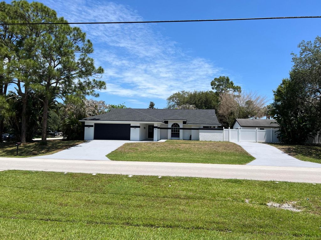 Photo of 1721 SW Ocean Cove Avenue, Port Saint Lucie, FL 34953 (MLS # B26022790)