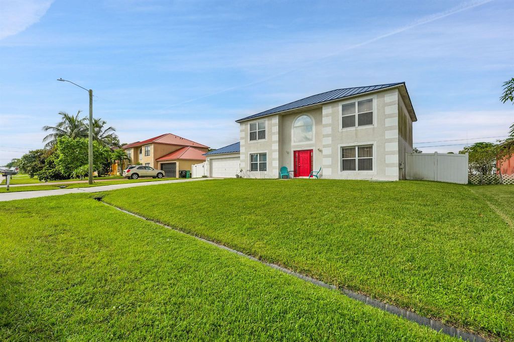 Photo of 4178 SW Tuscol Street, Port Saint Lucie, FL 34953 (MLS # R11128971)