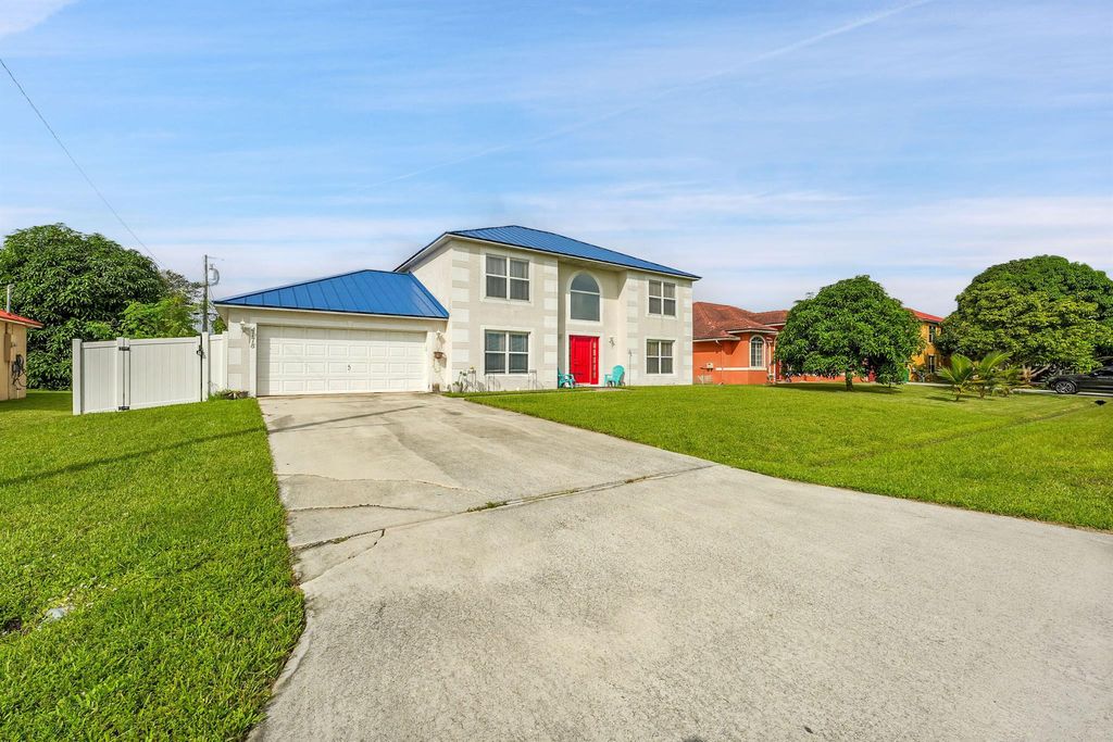 Photo of 4178 SW Tuscol Street, Port Saint Lucie, FL 34953 (MLS # R11128971)