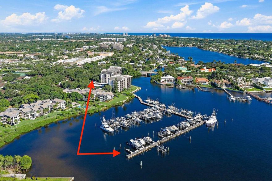 50' BOAT SLIP INCLUDED! Excellent opportunity for a discerning buyer looking to call the Palm Beaches home, whether part-time or full-time, and wanting to stay close to their boat in the highly sought-after Twelve Oaks gated community in North Palm Beach! This beautiful condo/villa features all-new Samsung kitchen appliances, a new central A/C HVAC system with ducting throughout, hurricane-rated windows and doors, and a screened-in patio. Completely updated and move-in ready, this single-level home offers a large primary suite with double sinks, a large walk-in shower with a bench seat, and multiple closets; a private secondary bedroom; a spacious living room that opens to the patio; a separate dining area that also opens to the patio; and an inviting kitchen next to a breakfast nook.