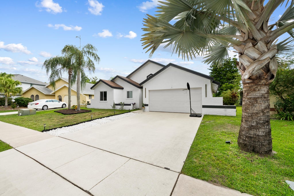 Photo of 22448 Swordfish Drive, Boca Raton, FL 33428 (MLS # B26028199)