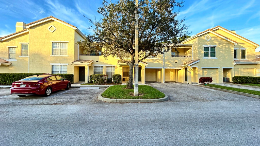 Photo of 104 SW Peacock Boulevard #204, Port Saint Lucie, FL 34986 (MLS # R11089998)