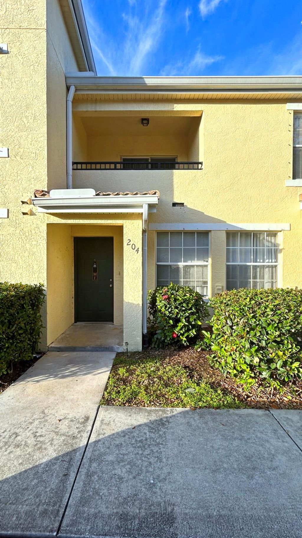 Photo of 104 SW Peacock Boulevard #204, Port Saint Lucie, FL 34986 (MLS # R11089998)