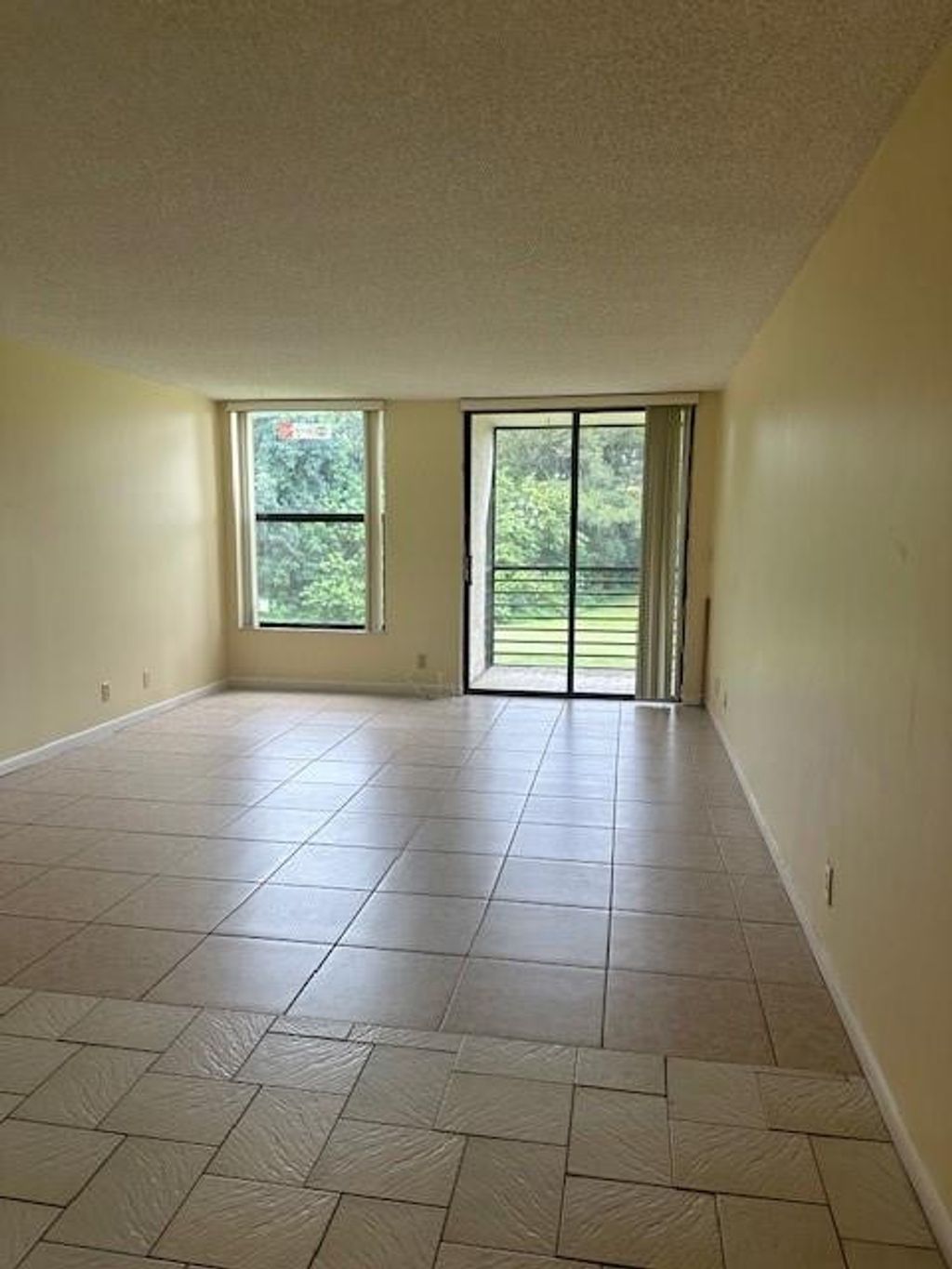 Photo of 8050 W Mcnab Road #210, Tamarac, FL 33321 (MLS # F10472044)