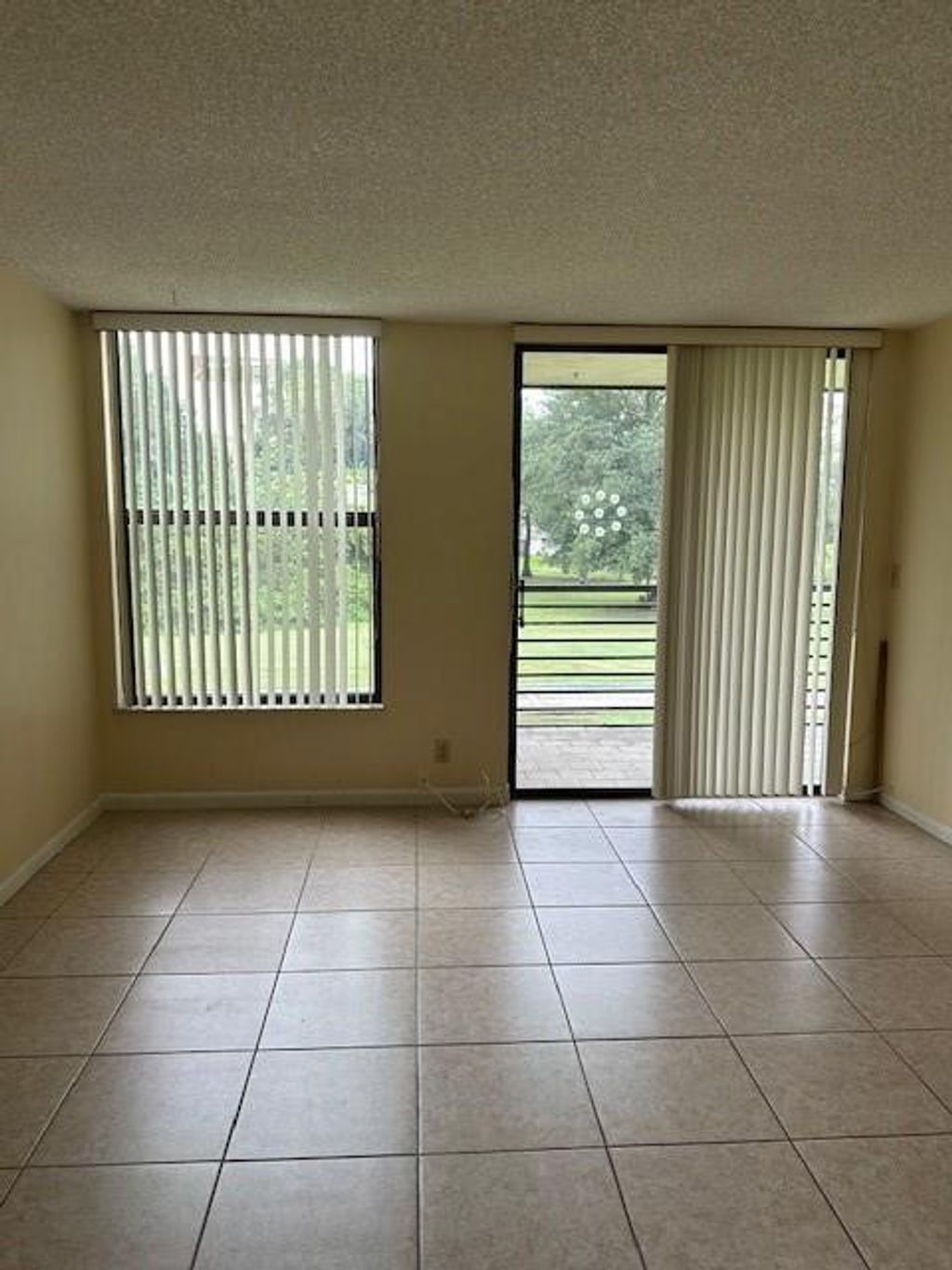 Photo of 8050 W Mcnab Road #210, Tamarac, FL 33321 (MLS # F10472044)