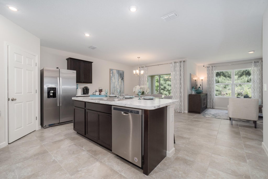 Photo of 2471 SW Brescia Street, Port Saint Lucie, FL 34953 (MLS # R10959273)