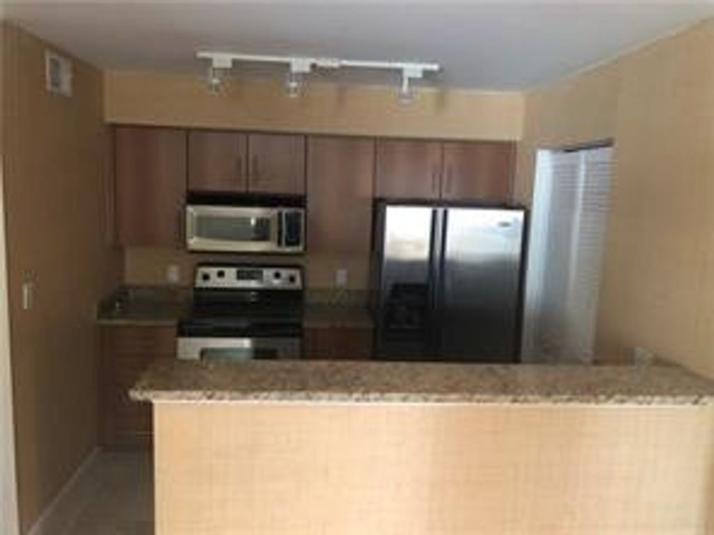 Photo of 1001 Crystal Way #E, Delray Beach, FL 33444 (MLS # B26025771)