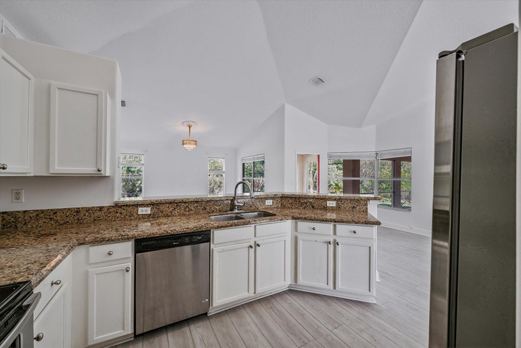Photo of 8671 155th Place N, Palm Beach Gardens, FL 33418 (MLS # B26050887)