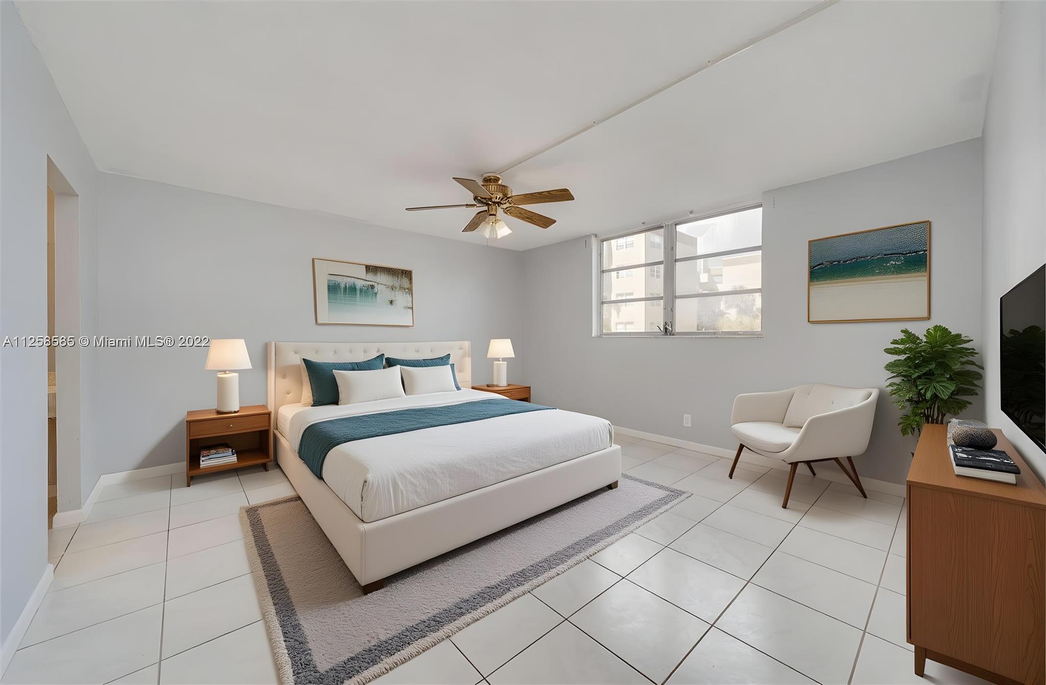 Investors & Homeowners! Rare opportunity to own a spacious 2 bed, 2 bath in elevator building at Polynesian Gardens -- priced right and move-in ready. This bright 2nd-floor unit features tile floors throughout, fresh paint, and a screened balcony. Low HOA ($482/mo) includes reserves. Resort-style amenities: heated pool, tiki BBQ area, clubhouse, gym, sauna, tennis, security patrol, & more! Pet-friendly (w/ board approval). 1 assigned parking + storage. Laundry on each floor. Assoc requires 650+ credit. Can rent after 1 year!