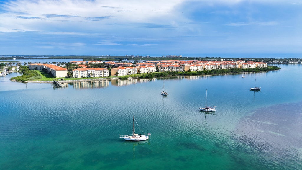 Photo of 26 HARBOUR ISLE Drive W #102, Fort Pierce, FL 34949 (MLS # B26072575)