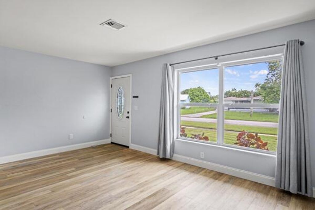 Photo of 386 NE Orchard Street, Port Saint Lucie, FL 34983 (MLS # R11127902)