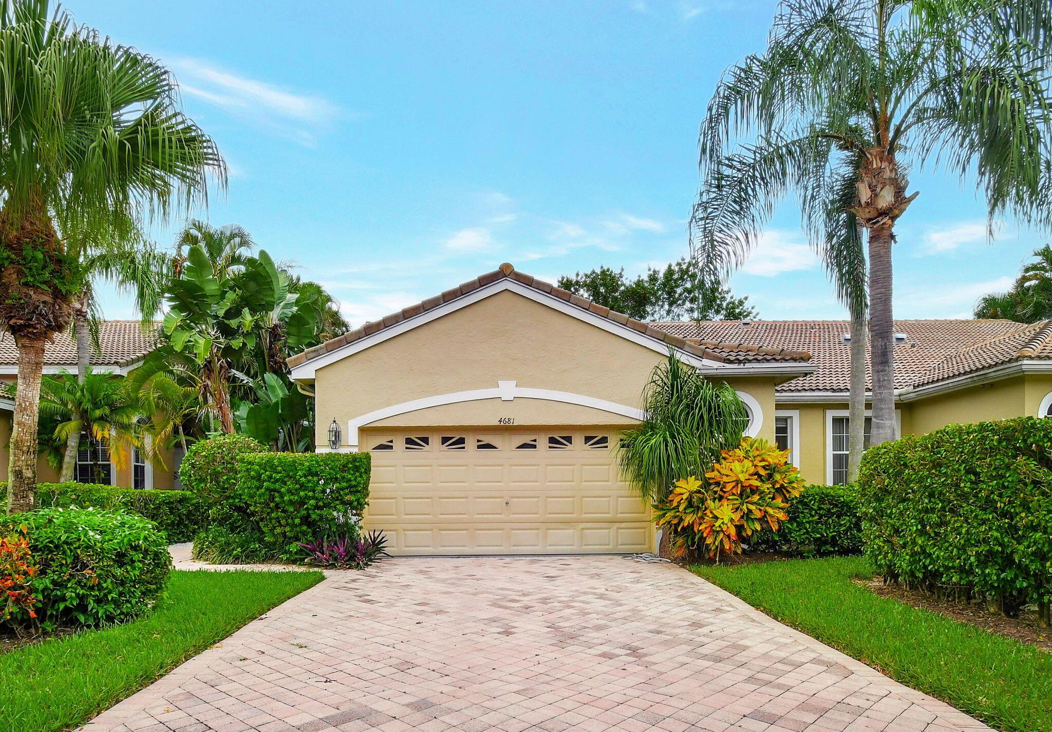Welcome to this lovely 3-bedroom, 2-bathroom villa in Wycliffe Golf & Country Club! This home features beautiful tile flooring throughout, with upgraded luxery vinyl in the bedrooms for added comfort. Enjoy cooking in the modern kitchen with granite countertops, a stylish tiled backsplash, and stainless-steel appliances. The primary bathroom boasts an updated frameless glass shower, new tile & updated cabinets offering a sleek, spa-like experience. Step outside to a spacious covered and screen-enclosed patio, perfect for relaxing in your private yard. This villa offers serene living on an interior lot, ensuring both privacy and tranquility. Move in ready with the rare option to purchase a non-golf membership. Come see this residence for yourself, you won't be dissapointed.