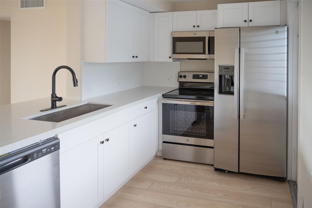 Photo of 3001 S Course Drive #209, Pompano Beach, FL 33069 (MLS # F10556406)