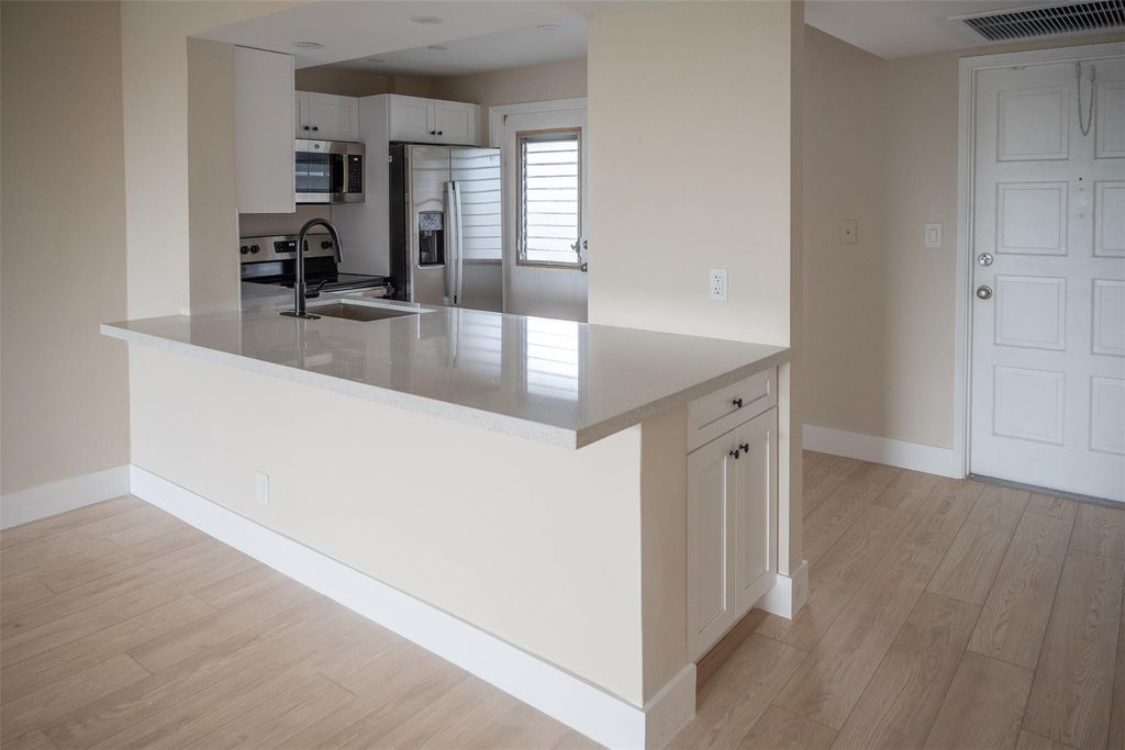 Photo of 3001 S Course Drive #209, Pompano Beach, FL 33069 (MLS # F10556406)