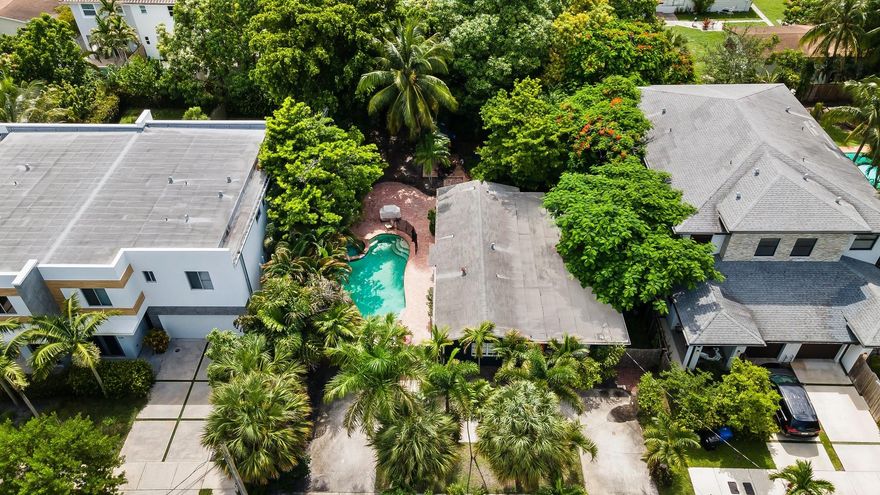 INVESTORS!!! This 3/2 home was affected by the flood. AS-IS, CASH ONLY. You are able to build up to 3 units on this 10,128 SQFT lot (see attached email from city). Or, renovate this 1,456 SQFT home and make it your own! Large pool in the backyard. $1MM+ new construction in the area! Walk to shops and restaurants on 13th Street & in Flagler Village. Minutes to the beach and downtown. All appliances are NOT included. Call me with any questions!
