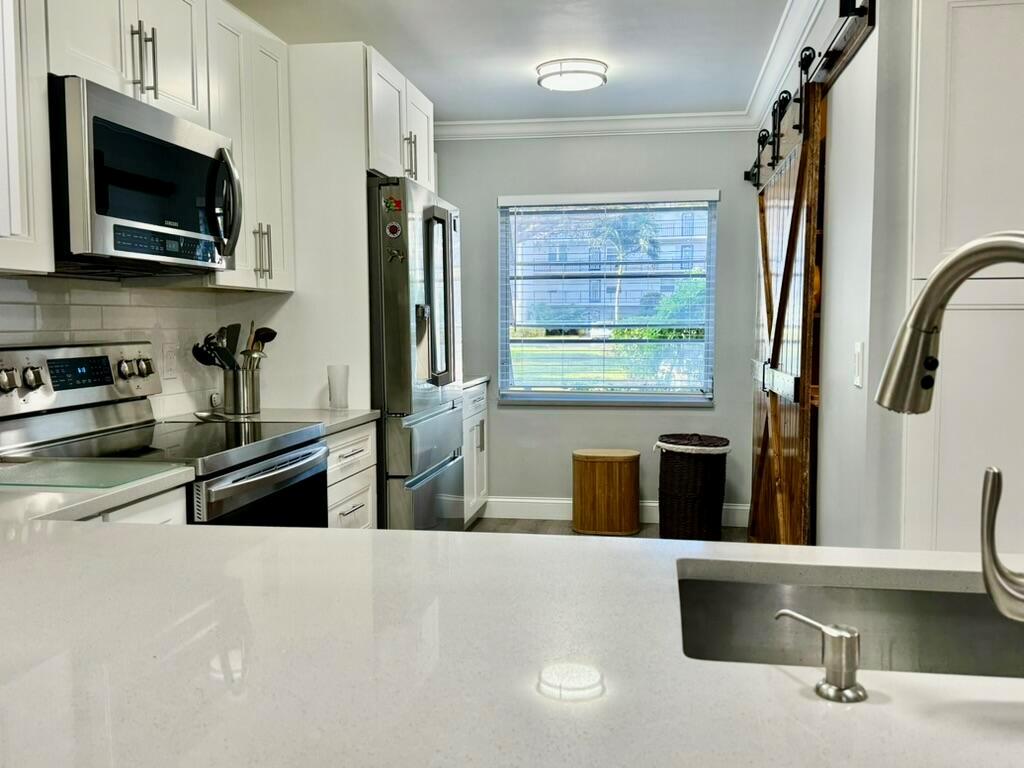 VILLAGES OF ORIOLE DEAUVILLE CONDO - Residential Lease