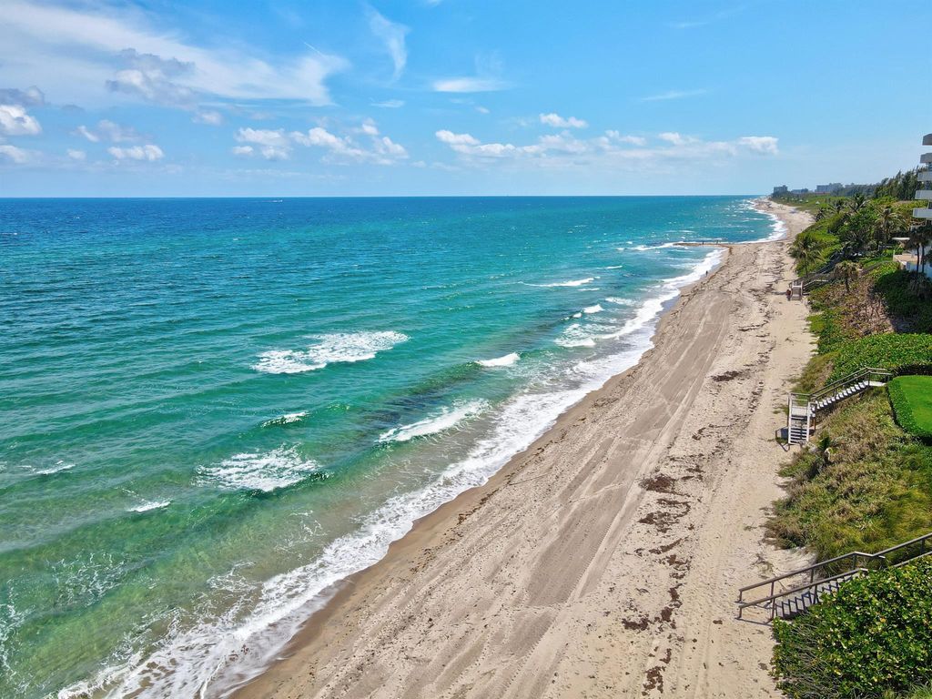 Photo of 1035 Boca Cove Lane, Highland Beach, FL 33487 (MLS # R10974834)