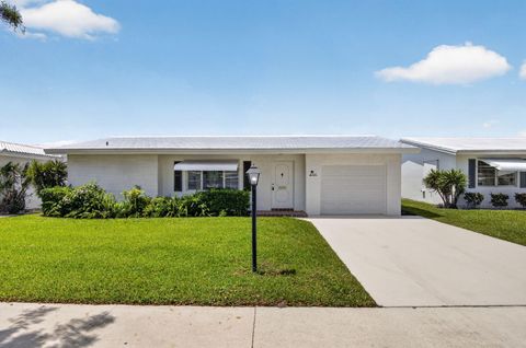 Photo of 703 SW 18th Street, Boynton Beach, FL 33426 (MLS # B26021849)