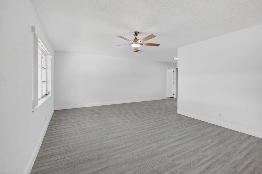 Photo of 703 SW 18th Street, Boynton Beach, FL 33426 (MLS # B26021849)