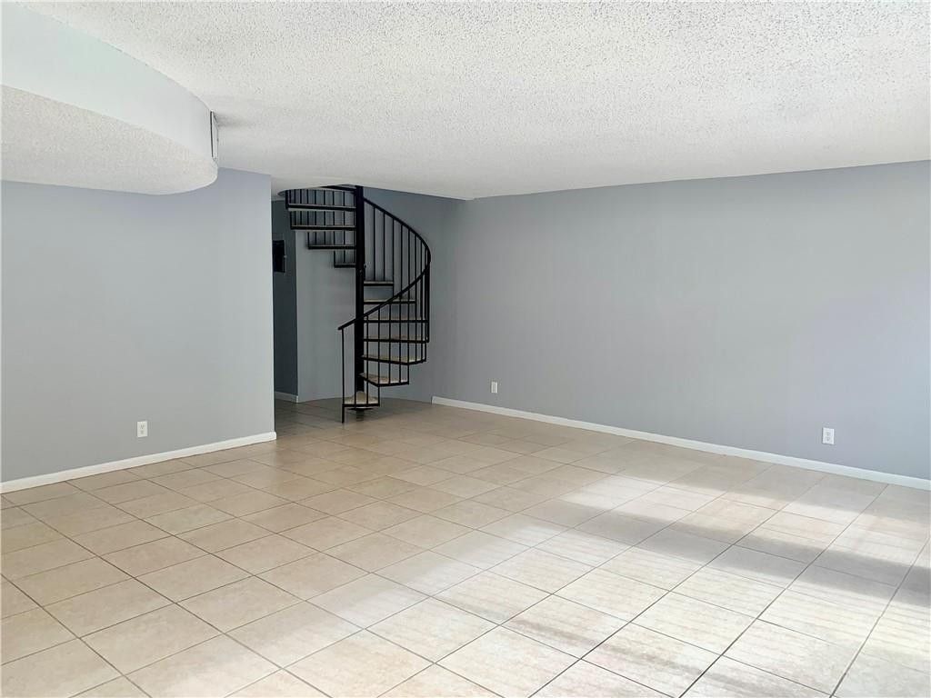 Photo of 680 Tennis Club Drive #103, Fort Lauderdale, FL 33311 (MLS # F10537462)