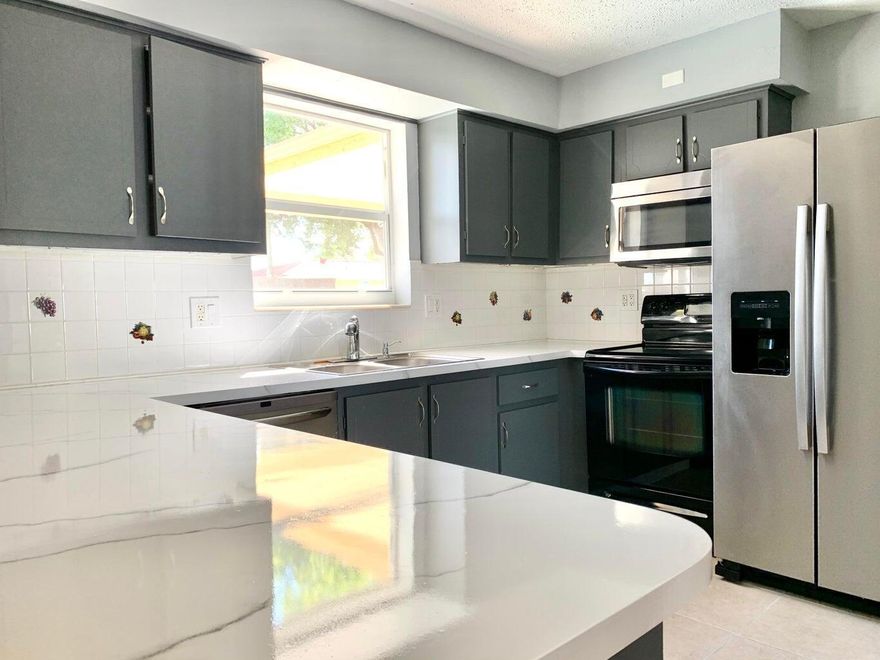 West Boca 3/2 + bonus room (can be used as an office) house with a pool and 2-car garage. Well-kept and cozy home in a great family neighborhood with A-rated schools. Freshly painted inside and out with updated bathrooms. Great outdoor entertainment area, fenced in - dogs welcome! Quiet area, yet conveniently located, walking distance to schools, steps away from Windjammer Park, and minutes away from South County Regional Park with lots of entertainment options for the kids and a public golf course. The landlord takes care of the pool and lawn. 1st, double security req.