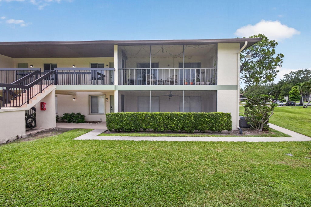 Photo of 6341 Chasewood Drive #D, Jupiter, FL 33458 (MLS # B26044620)