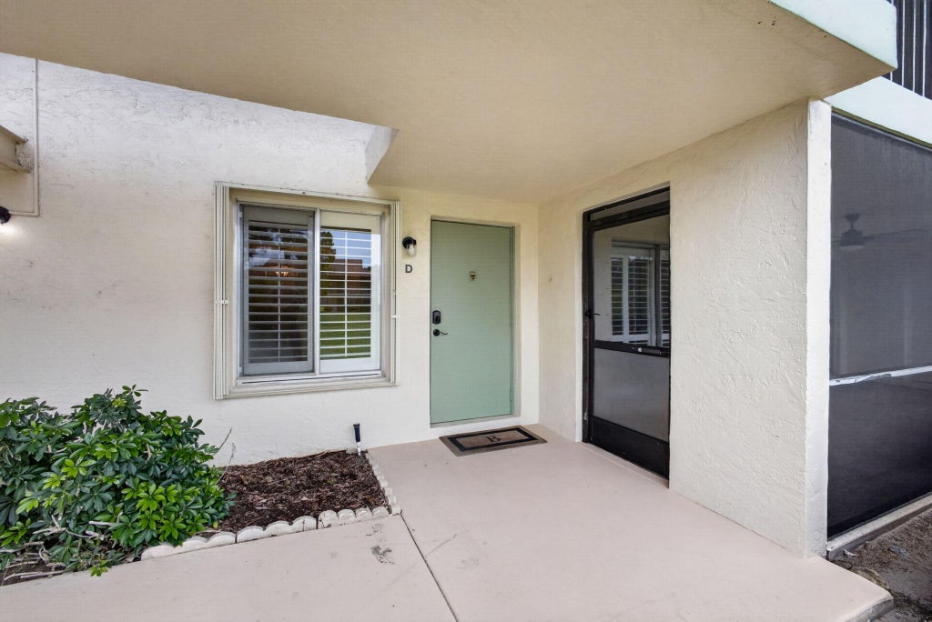 Photo of 6341 Chasewood Drive #D, Jupiter, FL 33458 (MLS # B26044620)