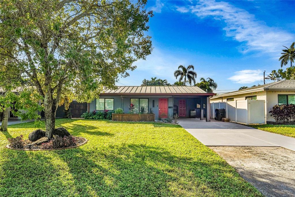 Photo of 380 NW 47th Ct, Fort Lauderdale, FL 33309 (MLS # F10540739)