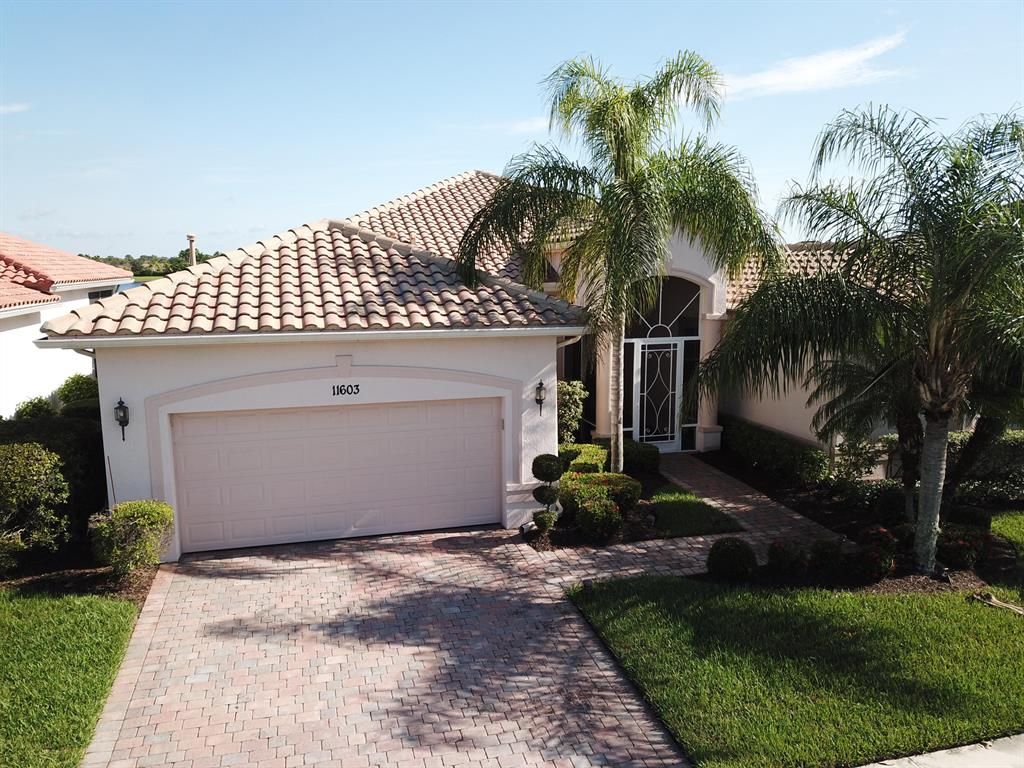 Photo of 11603 SW Apple Blossom Trail, Port Saint Lucie, FL 34987 (MLS # R10723213)