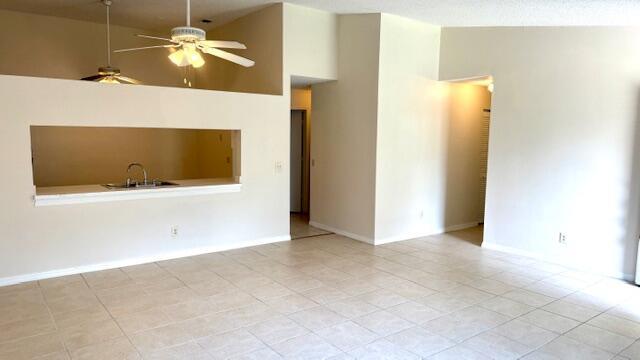 Charming end unit villa, 2 bedrooms, 2 bathrooms with assigned carport, all appliances are included, ready to move in. Enjoy the the amenities of this gate community, pool, tennis court, peacefulenvironment.