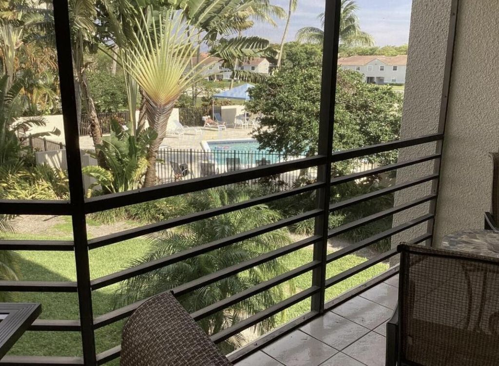 Photo of 5851 Camino Del Sol #203, Boca Raton, FL 33433 (MLS # B26007510)