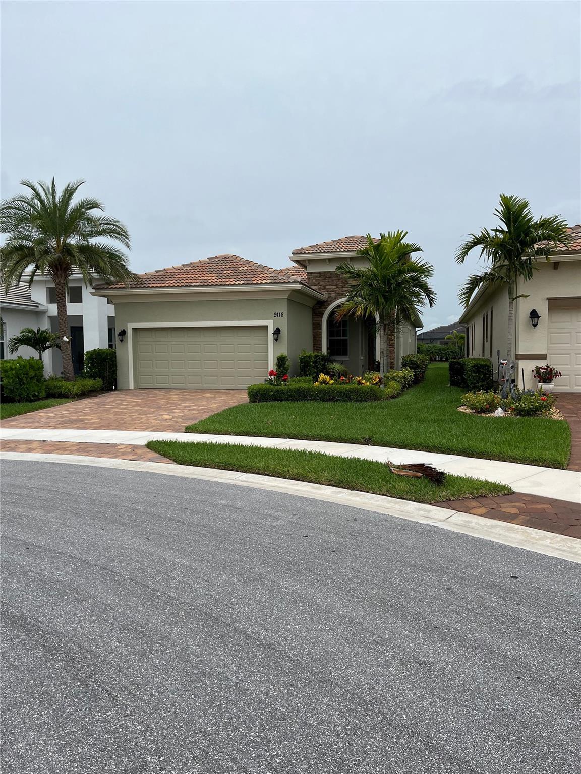 This 1834 sq. foot water view home in Cresswind PGA Verano (55+ neighborhood) is a dream. This resplendent 2-bedroom, 2-bathroom w office/den home sits in a cozy cul-de-sac near the Cresswind pool. This home allows you to golf easily at the PGA course (membership is handled separately) and you can enjoy the beautiful club house with tons of amenities, activities and classes. Indoor/outdoor pools, sauna, workout room. The home itself has many upgrades to the Casita floorplan ie; insulated ceiling and door in the garage, upgraded Samsung dishwasher, gorgeous glass front door, custom lighting fixtures throughout, in-floor electrical outlet and extra outlet near front door for fountain if you like! High quality plantation shutters, hiking path & golf cart path close to your front door.