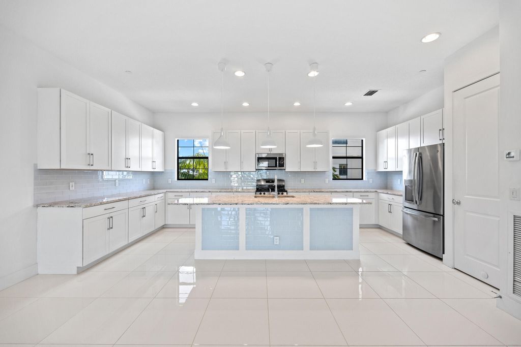 Photo of 4107 Faraday Way, Palm Beach Gardens, FL 33418 (MLS # R11062238)