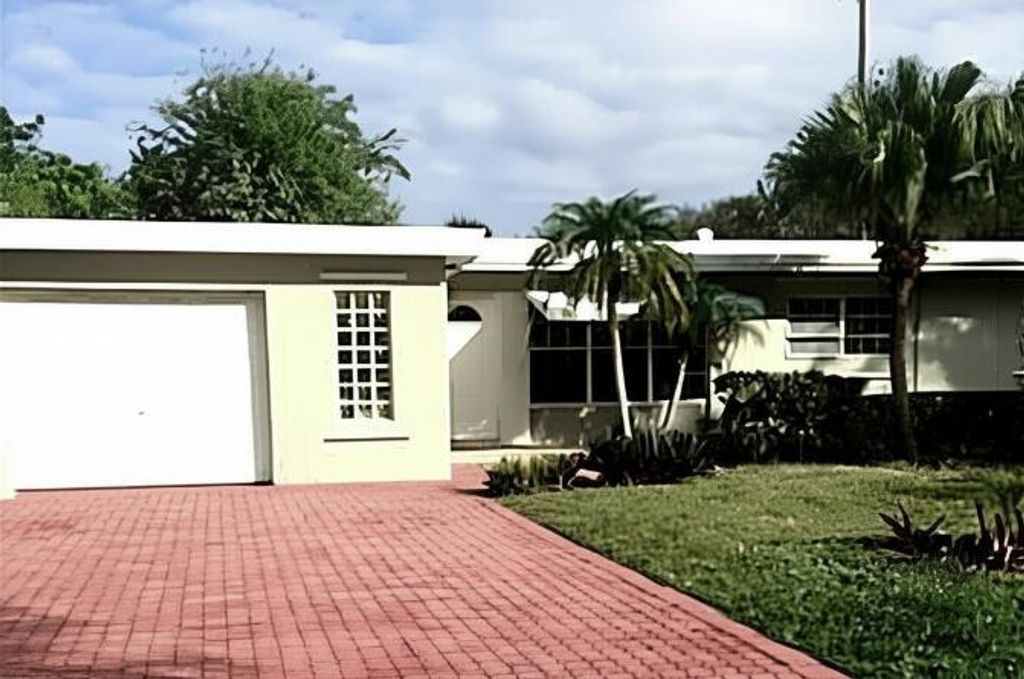 Photo of 1230 NE 26th Terrace, Pompano Beach, FL 33062 (MLS # B26013031)