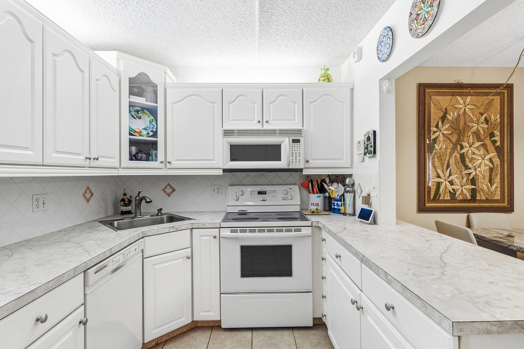 Photo of 314 Knotty Pine Circle #C-1, Greenacres, FL 33463 (MLS # R11167278)