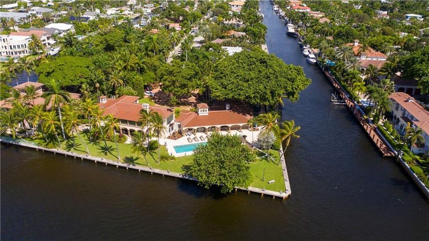 With over 520ft of deep water front and 52,895sf of breathtaking land, this iconic architectural gem famously known as the Anheuser Busch house is situated on prime point lot waterfront land.  The home has been being stripped to the studs by a stellar team of Architects, Engineers, Contractors. Owner is ready to sell "AS IS" so the house could be retained and modernized, OR demolished and sold for LAND. With OVER an ACRE of lush landscaped land with its distinctive gazebo for outdoor dining, an oversized lap pool & jacuzzi and jaw dropping sculptural Banyon tree this estate is truly one of a kind property never to be seen again. A new raised seawall to present code has been installed and "No Profile"boat lift (40ft)is due Nov.