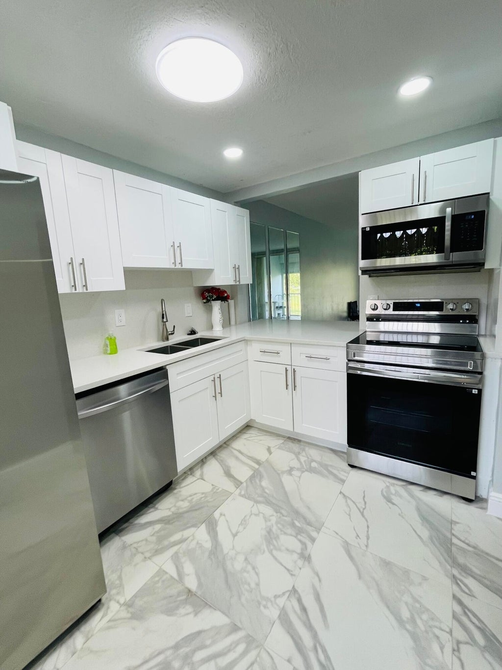 Photo of 5980 NW 64TH Avenue #203, Tamarac, FL 33319 (MLS # B26051994)