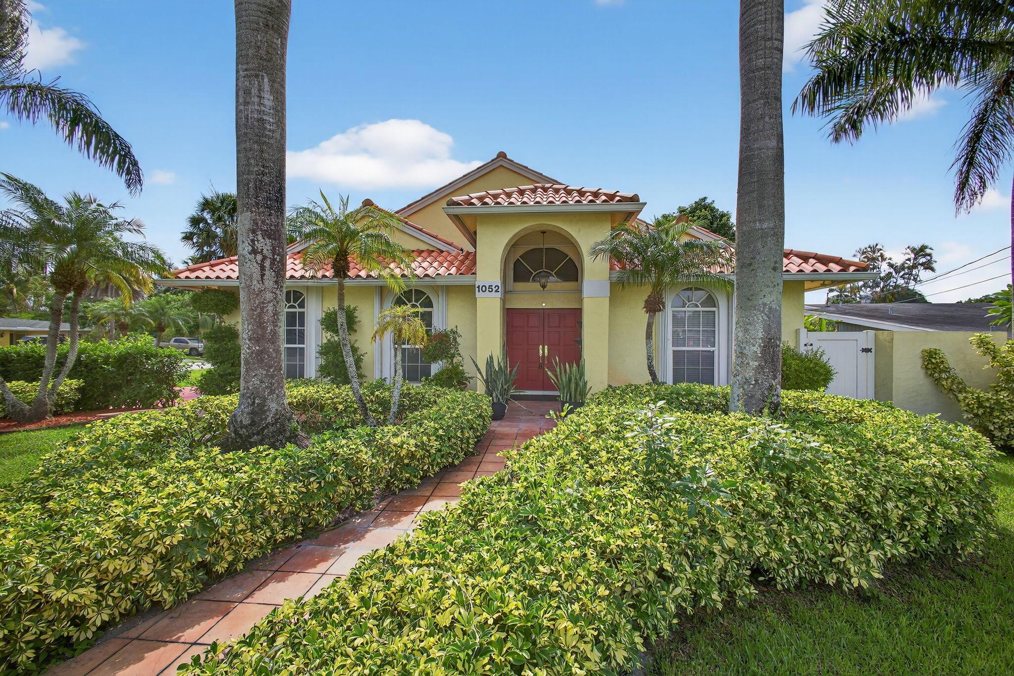Welcome to this beautifully maintained and meticulously cared-for 3-bedroom, 2-bath home, nestled in one of the area's **most desirable neighborhoods--**and best of all, no HOA! From the moment you arrive, you'll notice the pride of ownership throughout. The home features vaulted ceilings that create an airy, open feel, and has been freshly painted inside and out, giving it a crisp, clean look. Recent upgrades add modern comfort while preserving its charming character.Perfectly situated on a corner lot, this home backs to a peaceful interior canal, offering privacy and a serene natural view. The spacious yard has plenty of room for outdoor living, gardening, or future customization.This move-in-ready gem offers the rare combination of location and condition. Come experience the charm!