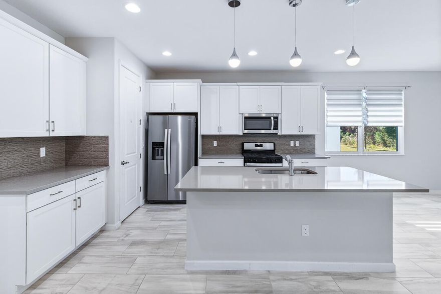 Live the Tradition lifestyle of luxury and community in your newer 4/3/2 in Manderlie. Impact windows, quartz counters and a spacious layout are only a few of the many bonuses that this 2021 build boasts. At Manderlie, you are in the heart of Tradition, just minutes from shopping, restaurants, and I95. 
With low HOA's and plenty of perks, this community has all the bonuses of luxury living mixed with the convenience that comes with owning in Tradition. Manderlie amenities include gated entrance, lawn care, pest control, event lawn & greenspace, clubhouse, fitness center, community pool, dog park, sports court, internet, and basic cable. Come see this beauty in person and make this your own piece of paradise!