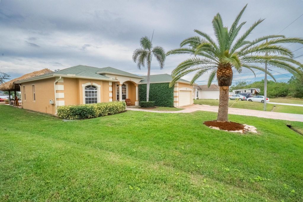 Photo of 623 SW Bradshaw Circle, Port Saint Lucie, FL 34953 (MLS # R10959855)